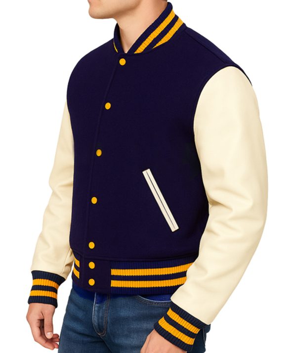 side view of a blue varsity jacket with beige leather sleeves